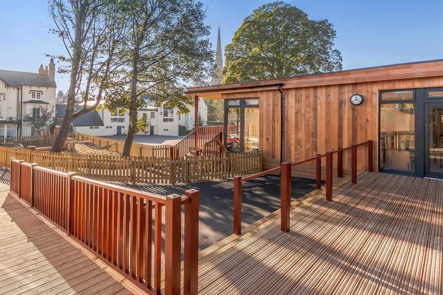 Brown-treated anti-slip decking used for Collegiate primary school grounds in Bristol